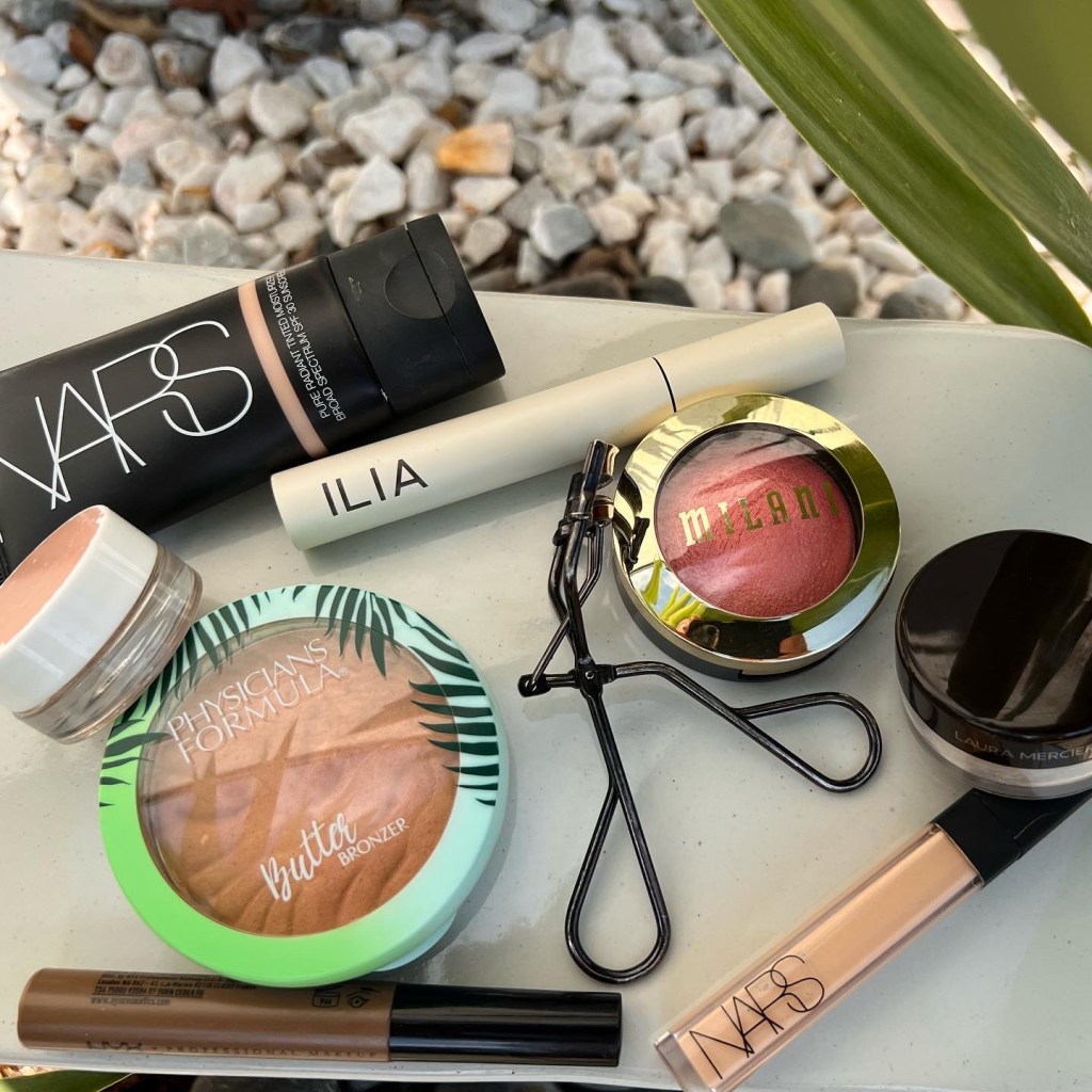 NARS tinted moisturizer, Physician's Formula Butter bronzer, NARS concealer, Milani blush, Shisheido black eyelash curler, Laura Mercier powder,Ilia mascara